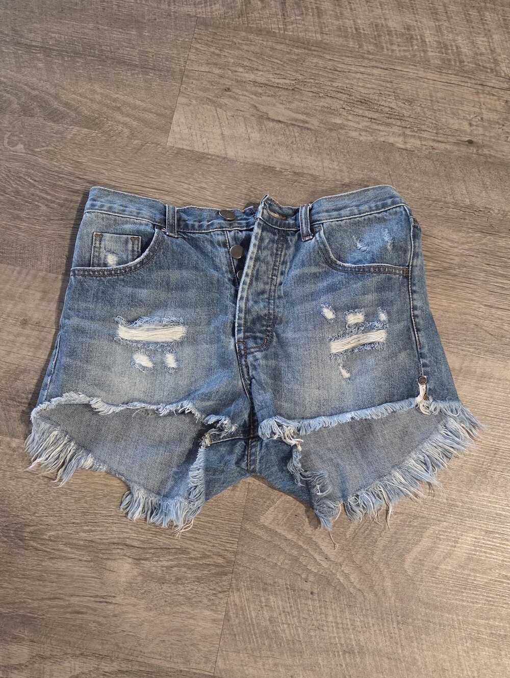 One Teaspoon Outlaws Distressed Denim Shorts.